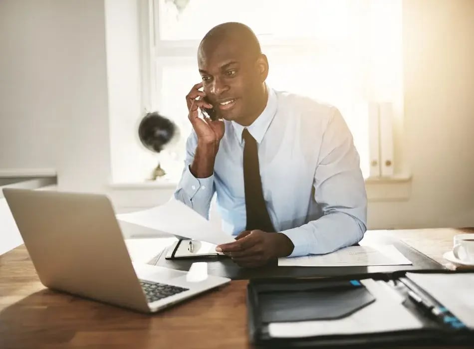 man on phone at office