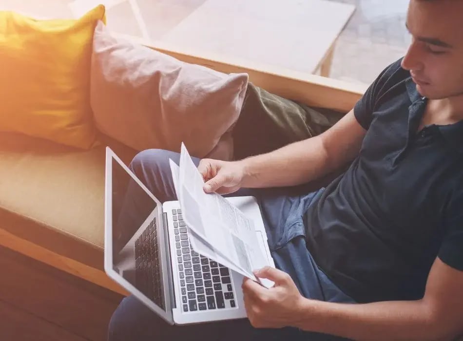 man on laptop reading